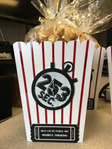 An award for the 253 Film Festival that is shaped liked a classic popcorn bag and contains real caramel corn